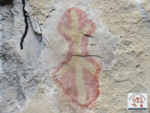 Painel com arte rupestre, lagarto em duas cores